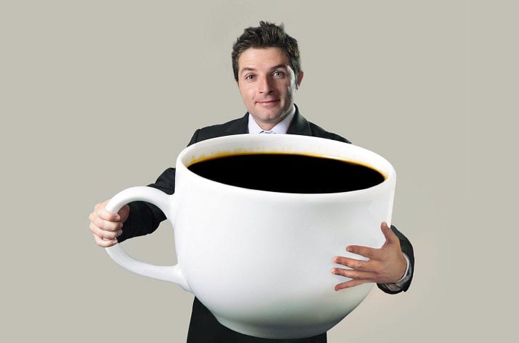 Man Holding Big Coffee Cup