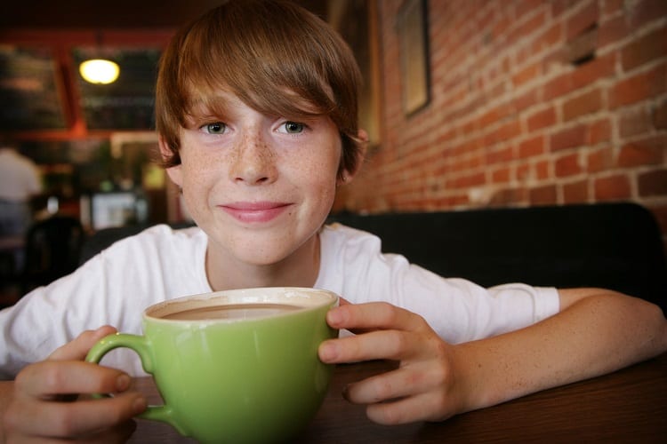 Boy Holding Coffee Cup